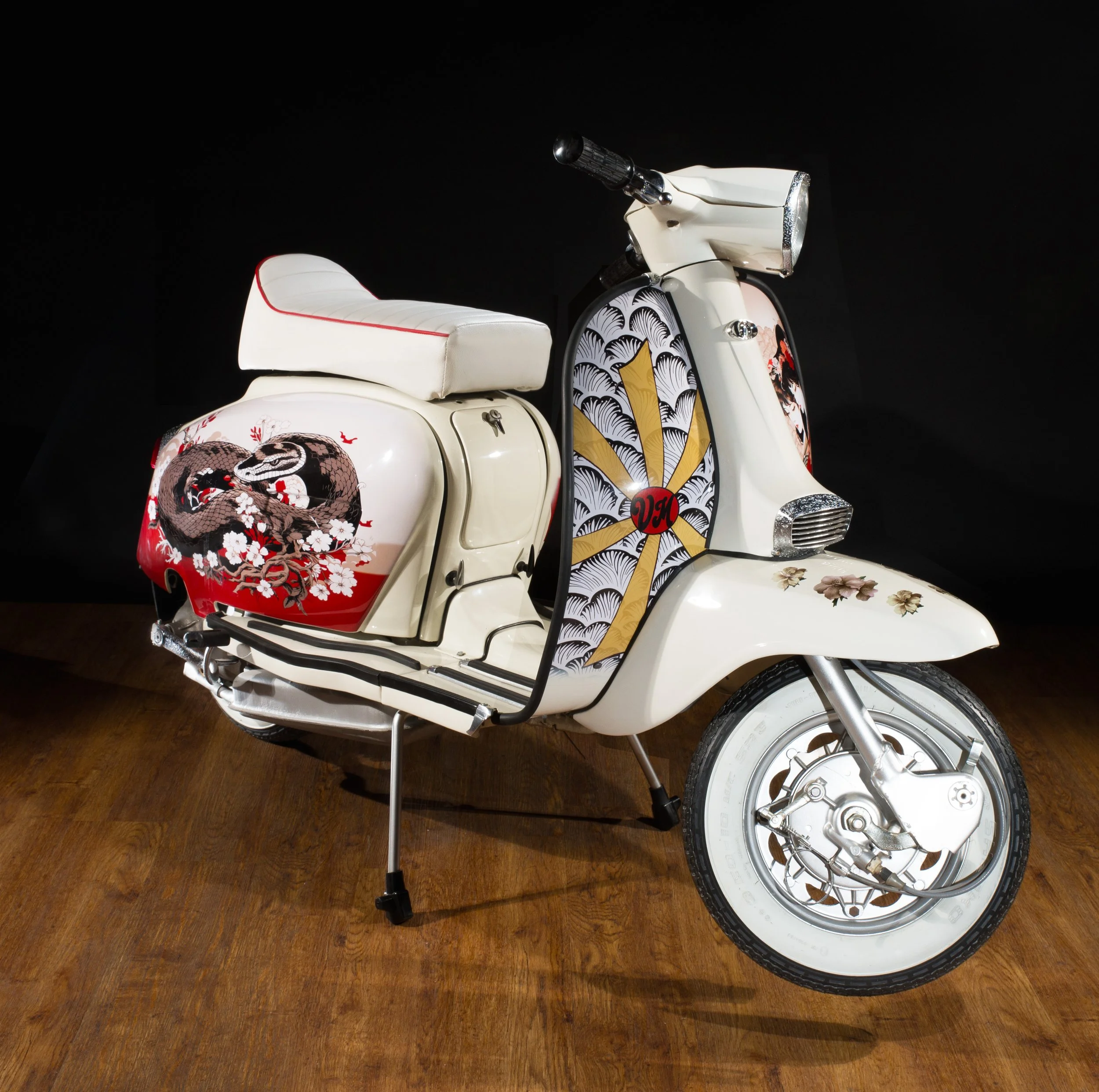 Unique, bespoke artwork compliments the iconic shape of this
